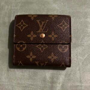 Louis Vuitton Elise Trifold wallet .